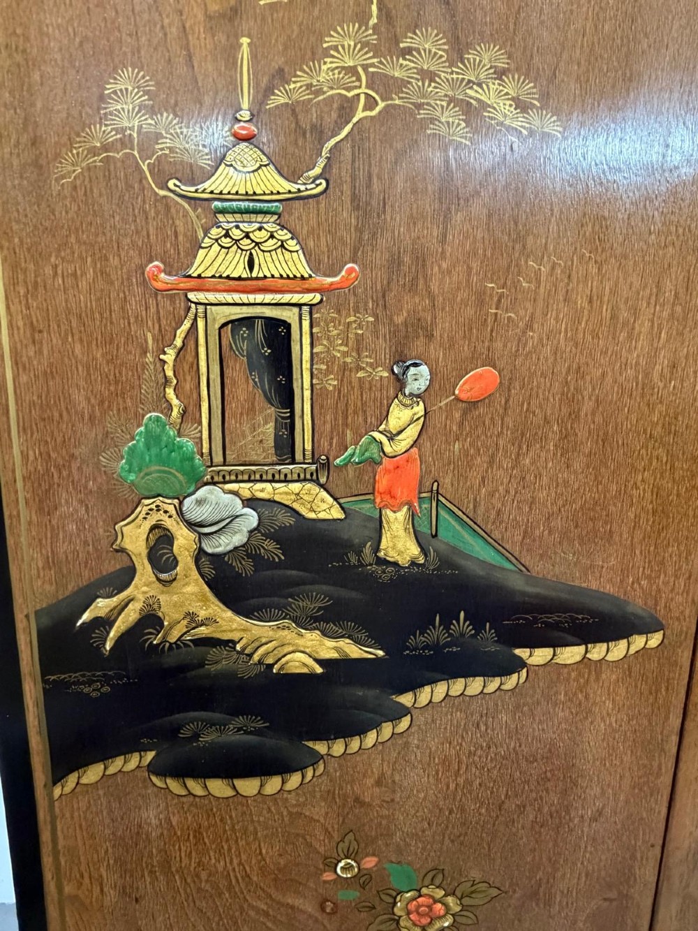 A two-door wooden compactum wardrobe decorated with hand-painted Chinoiserie scenes, pagodas, and figures set within dark lacquered borders. View VII