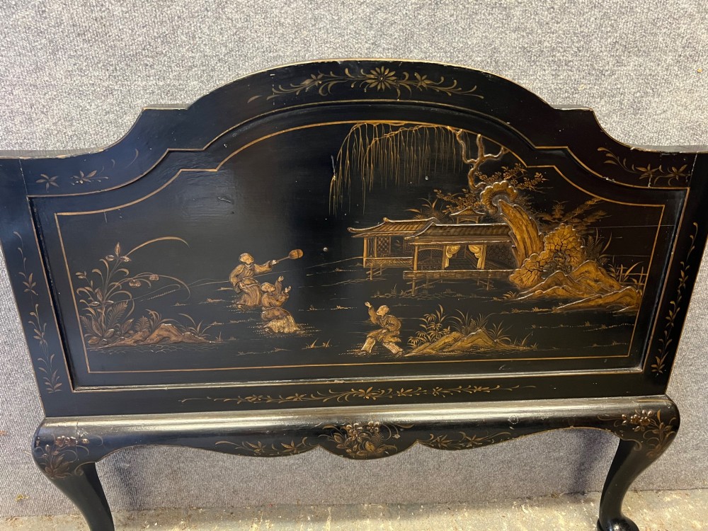 A black lacquered single bedstead featuring hand-painted gold Chinoiserie architectural scenes, arched top panels, and carved cabriole legs. View IX