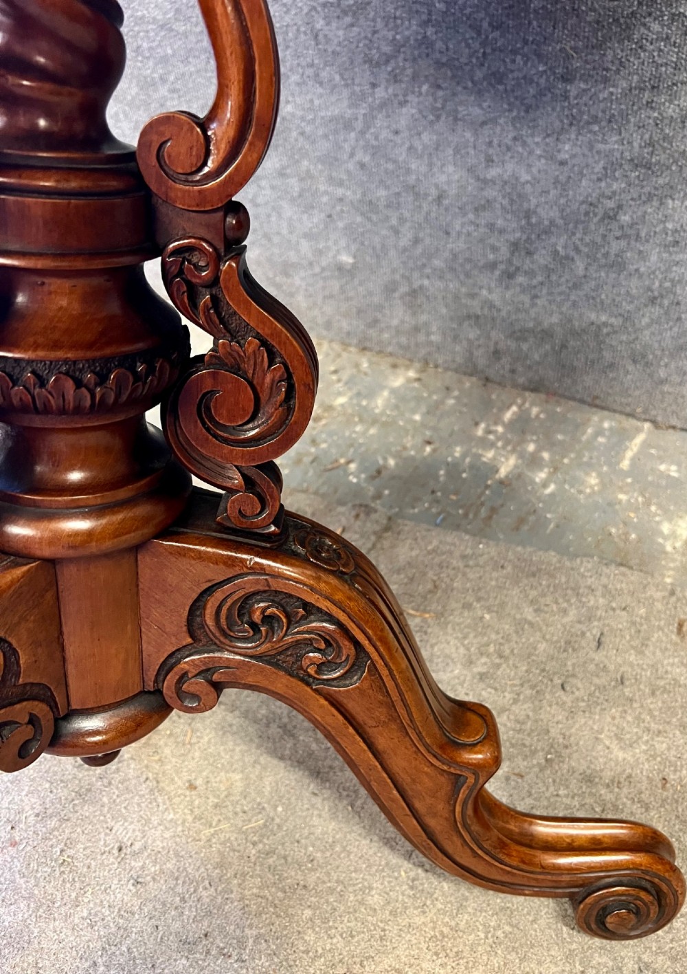 A 19th-century hexagonal specimen wood table featuring a geometric optical illusion parquetry top set on a carved central pedestal base. View VIII