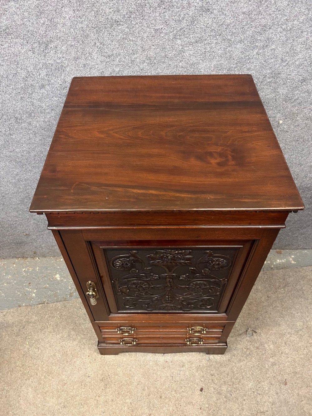 A Victorian mahogany cabinet with an open door revealing an internal Cyrus Price and Company iron safe above two lower drawers. View X