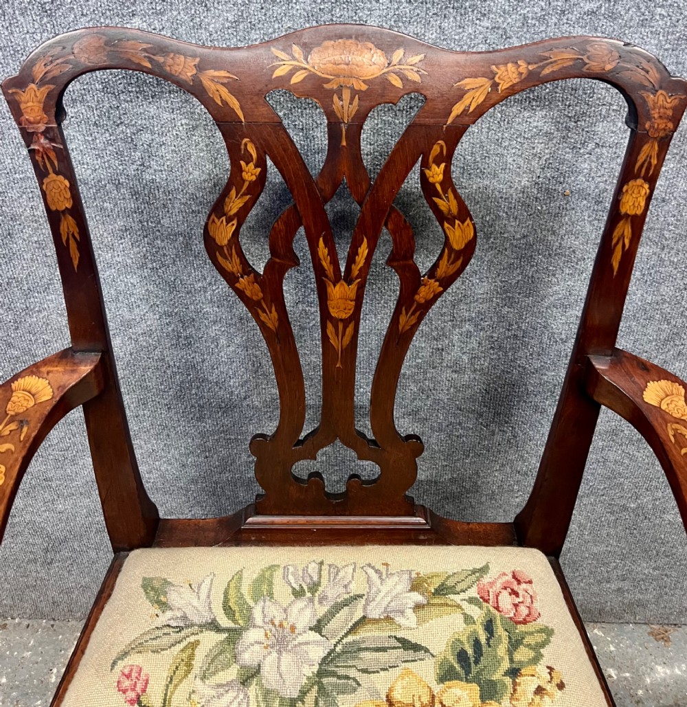 An antique mahogany armchair featuring floral marquetry wood inlays throughout the frame and splat, fitted with a floral needlepoint upholstered seat. View II