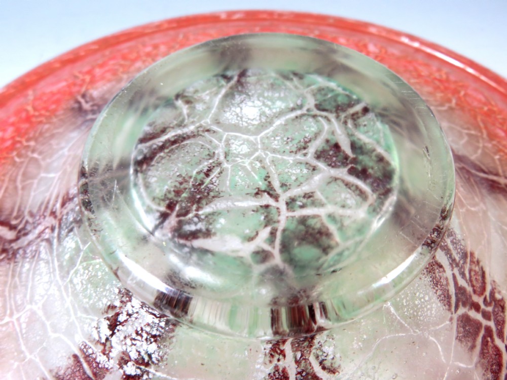 A circular Art Deco WMF Ikora glass bowl featuring a bright red crackle-effect rim and a clear centre with dark starburst inclusions. View V