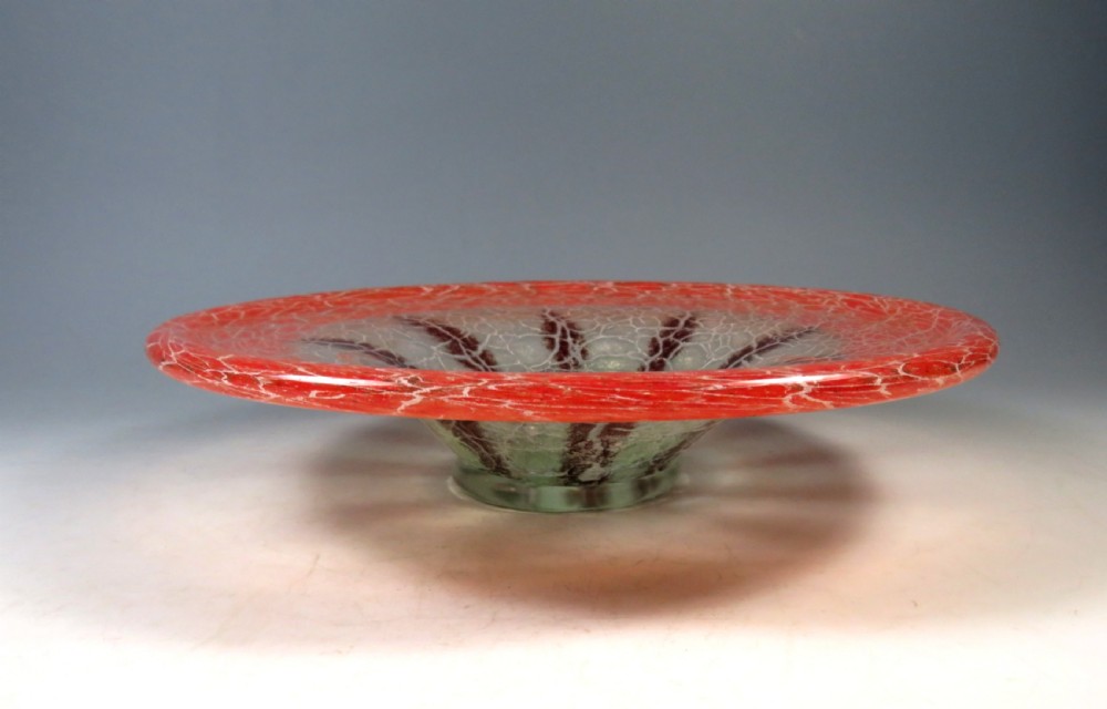A circular Art Deco WMF Ikora glass bowl featuring a bright red crackle-effect rim and a clear centre with dark starburst inclusions. View VII
