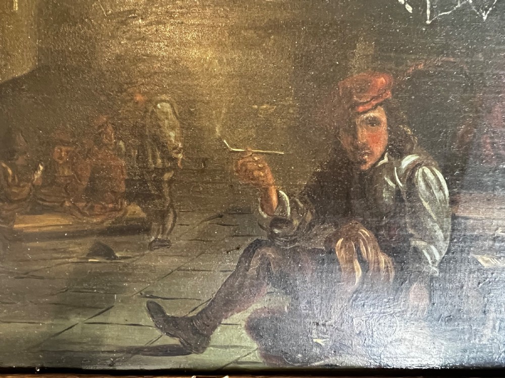 A Victorian oil painting on board depicting a seated man smoking a pipe in a tavern setting, framed in molded gilt wood. View III