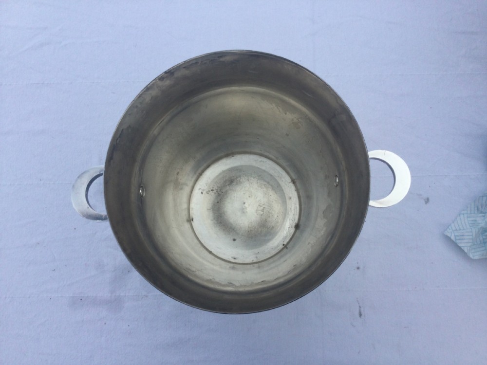 A polished silver-plated champagne bucket featuring reeded horizontal band decoration and ring side handles. View IV