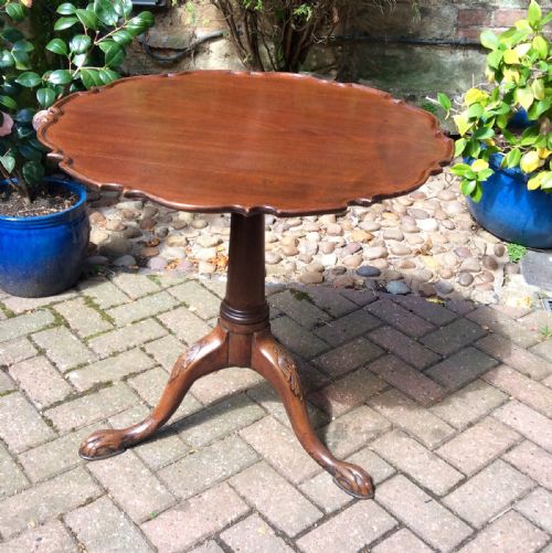 mahogany tripod with a pie crust top and carved base - CATEGORY: ANTIQUE TABLES - DATED VICTORIAN