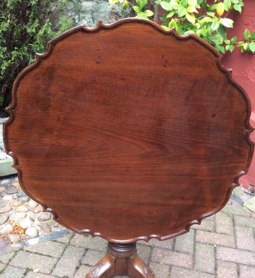 MAHOGANY TRIPOD WITH A PIE CRUST TOP AND CARVED BASE - ADDITIONAL PHOTO 1