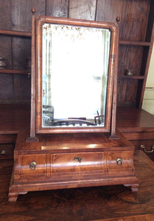 a rare early walnut toilet mirror - CATEGORY: ANTIQUE MIRRORS - DATED 1700