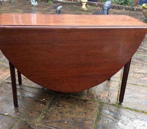 GEORGIAN MAHOGANY DROP LEAF OVAL DINING TABLE - ADDITIONAL PHOTO 3