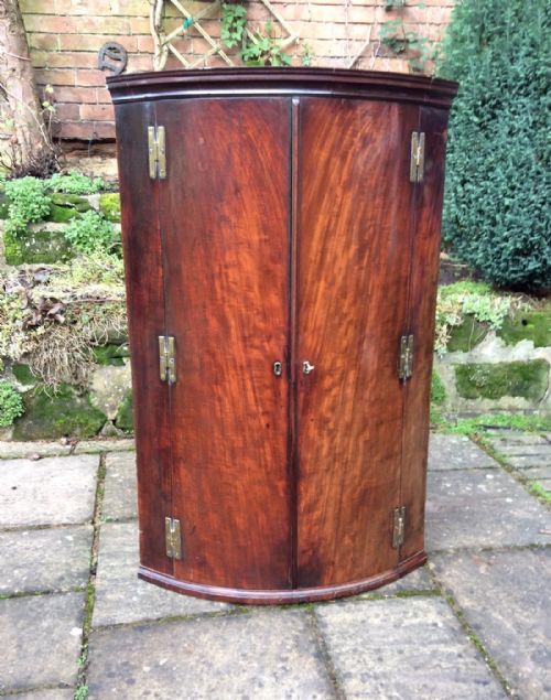 georgian mahogany bow front corner cupboard - CATEGORY: ANTIQUE CUPBOARDS - DATED GEORGIAN
