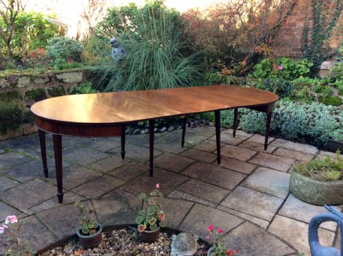 a large georgian mahogany dining table - CATEGORY: ANTIQUE TABLES - DATED 18TH CENTURY