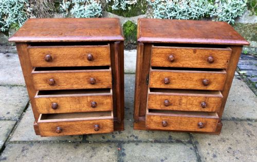 A PAIR OF MINIATURE OAK CHEST OF DRAWERS - ADDITIONAL PHOTO 1