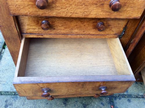 A PAIR OF MINIATURE OAK CHEST OF DRAWERS - ADDITIONAL PHOTO 3