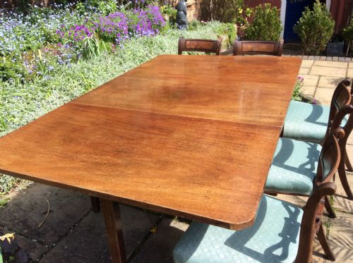 a large drop leaf mahogany dining table - CATEGORY: ANTIQUE TABLES - DATED 18TH CENTURY