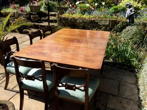 A LARGE DROP LEAF MAHOGANY DINING TABLE - ADDITIONAL PHOTO 4