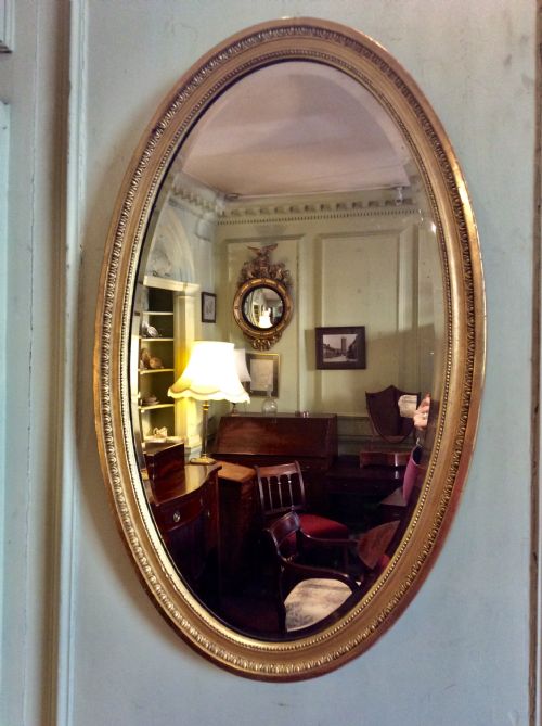 19th century large oval gilt mirror - CATEGORY: ANTIQUE MIRRORS - DATED 19TH CENTURY