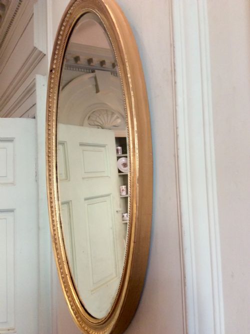 19TH CENTURY LARGE OVAL GILT MIRROR - ADDITIONAL PHOTO 1