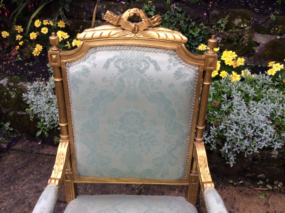 pair of Edwardian giltwood armchairs. View II