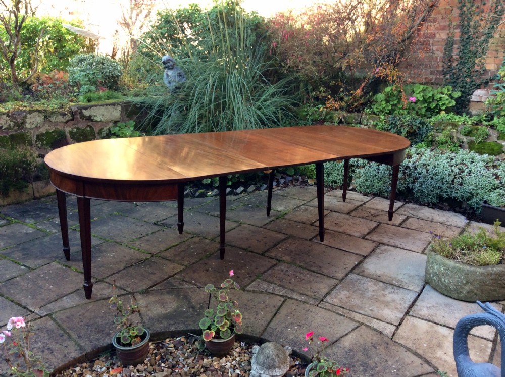 A large Georgian mahogany dining table