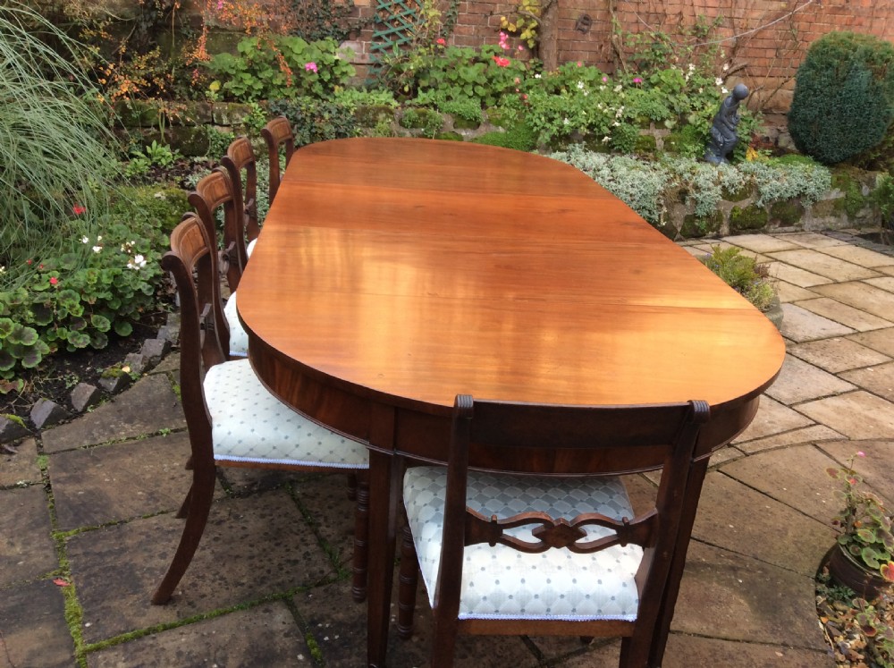 A large Georgian mahogany dining table View II