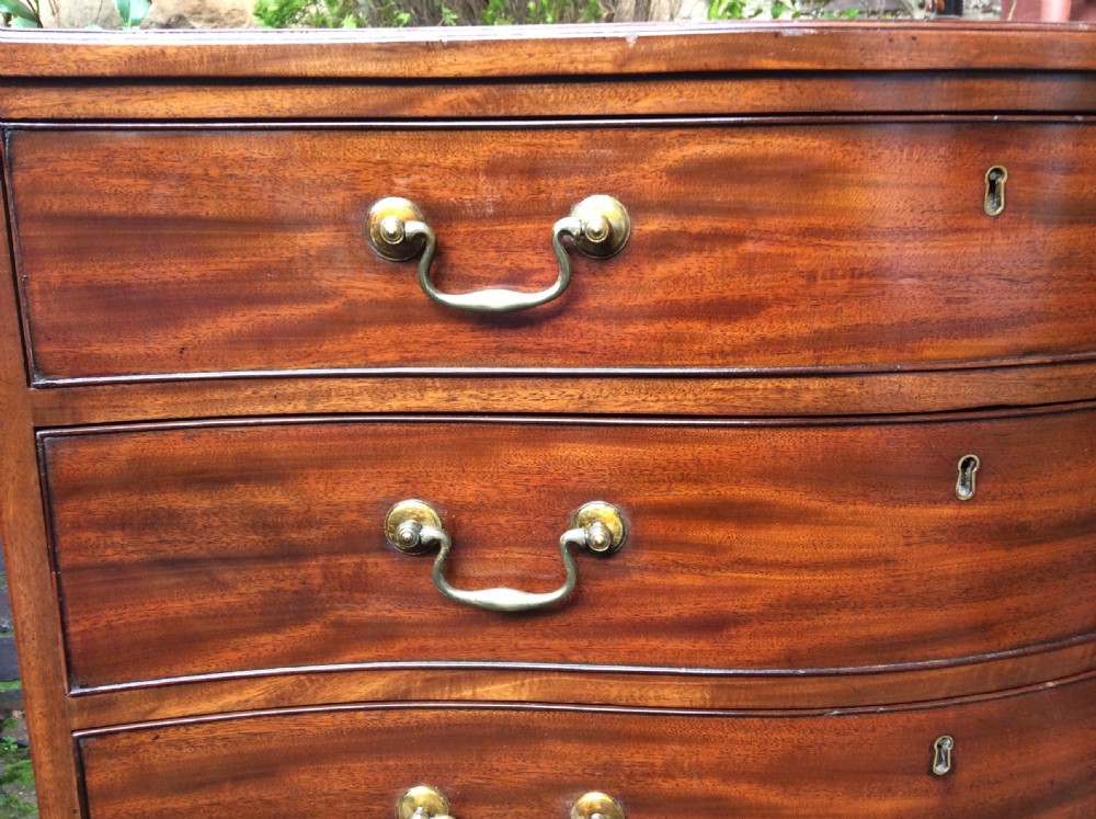 Georgian mahogany serpentine chest of drawers View II