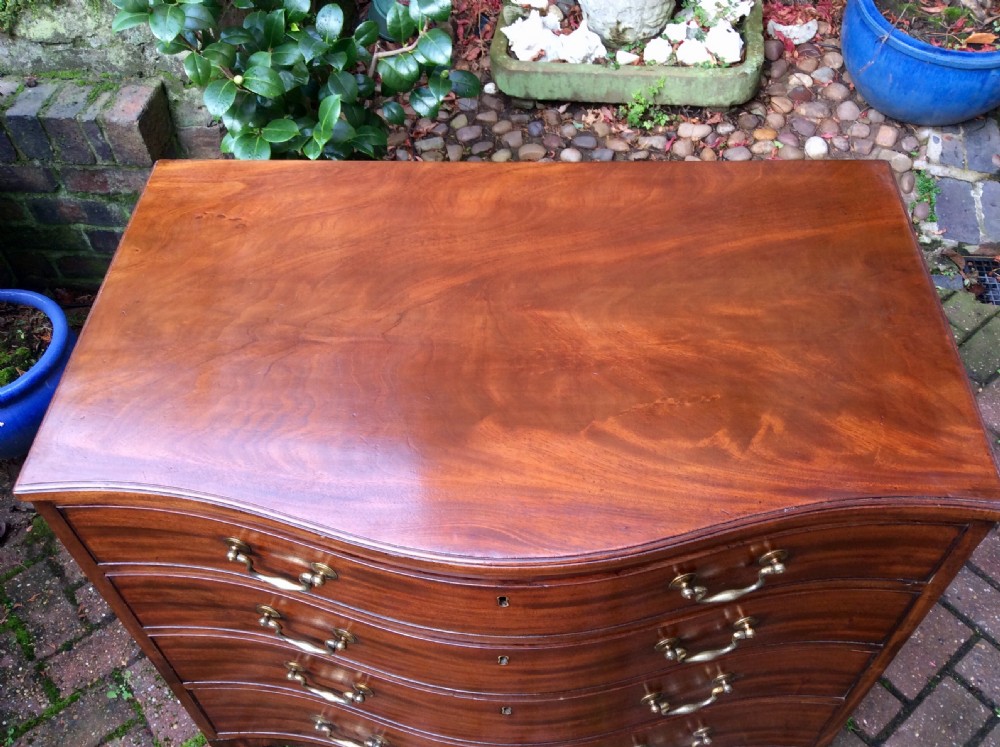 Georgian mahogany serpentine chest of drawers View VI