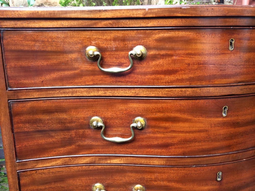 Georgian mahogany serpentine chest of drawers View VII