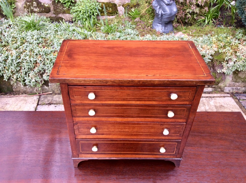 Miniature mahogany chest of drawers View III