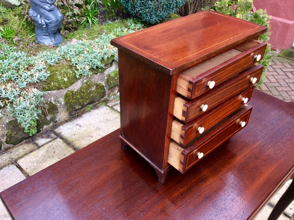 Miniature mahogany chest of drawers View IV