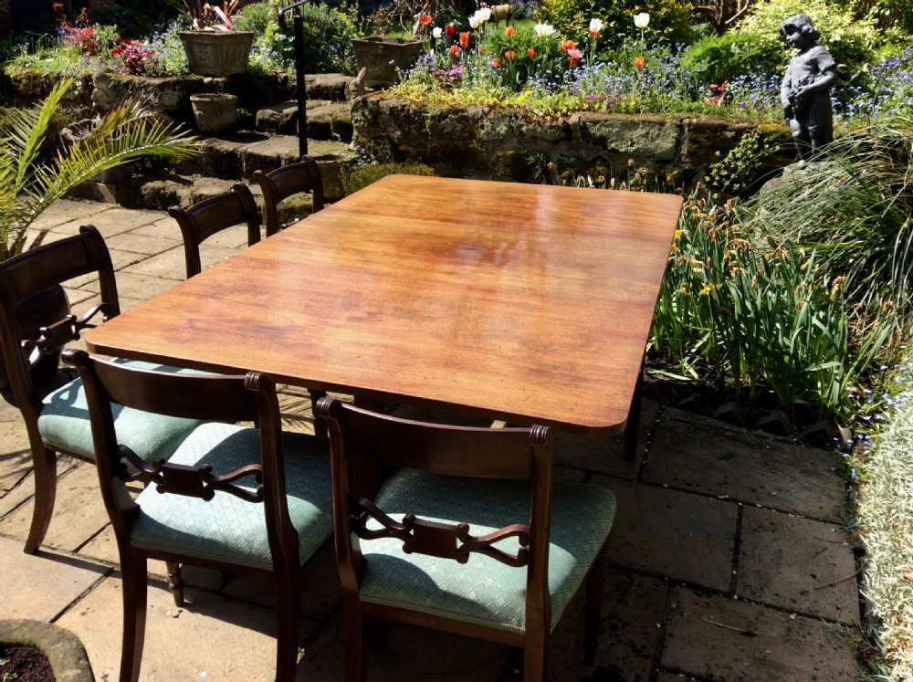 A large drop leaf mahogany dining  table View V