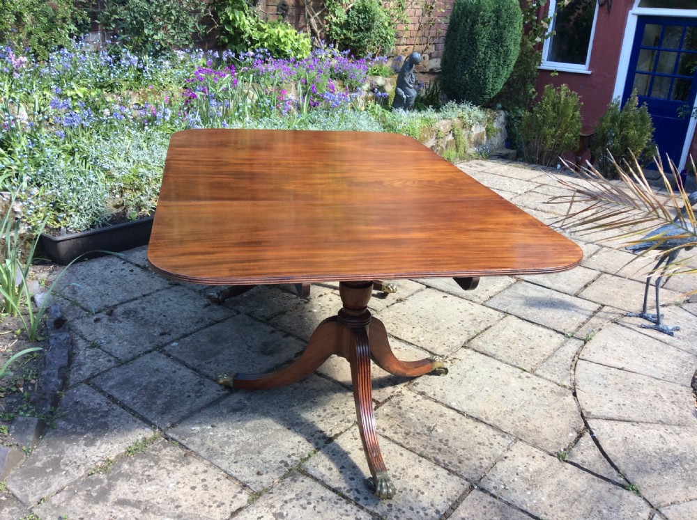 Regency mahogany pedestal dining table