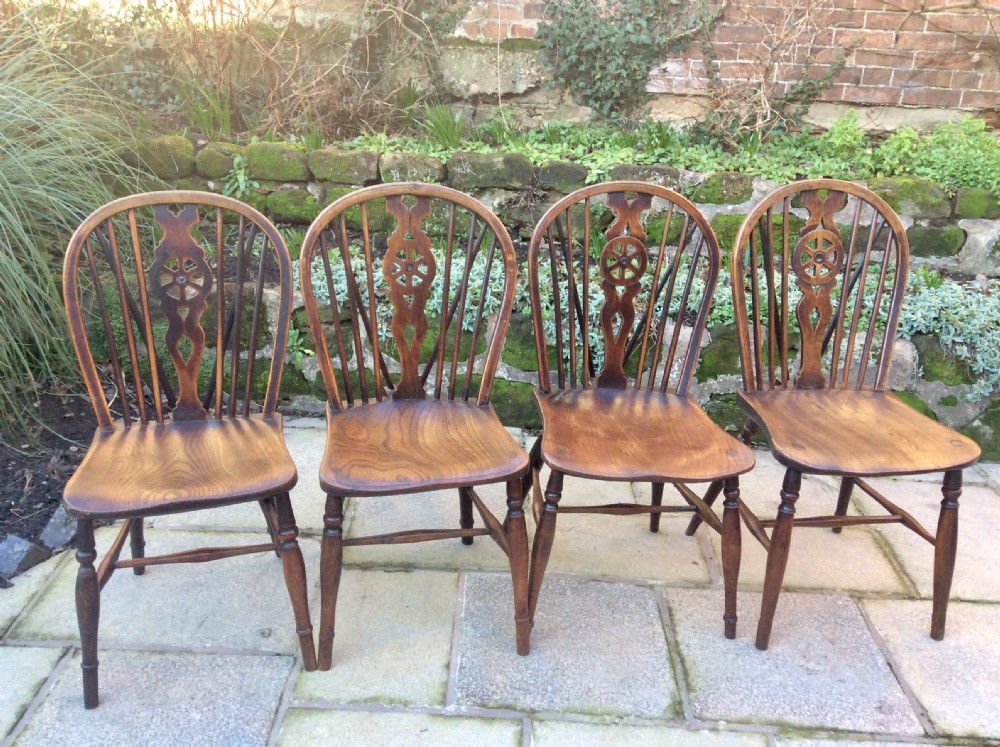 4  Windsor wheel-back chairs
