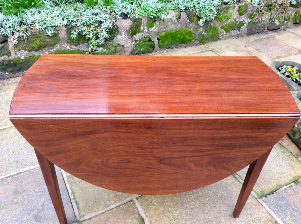 Small Georgian mahogany drop leaf dining table View IV