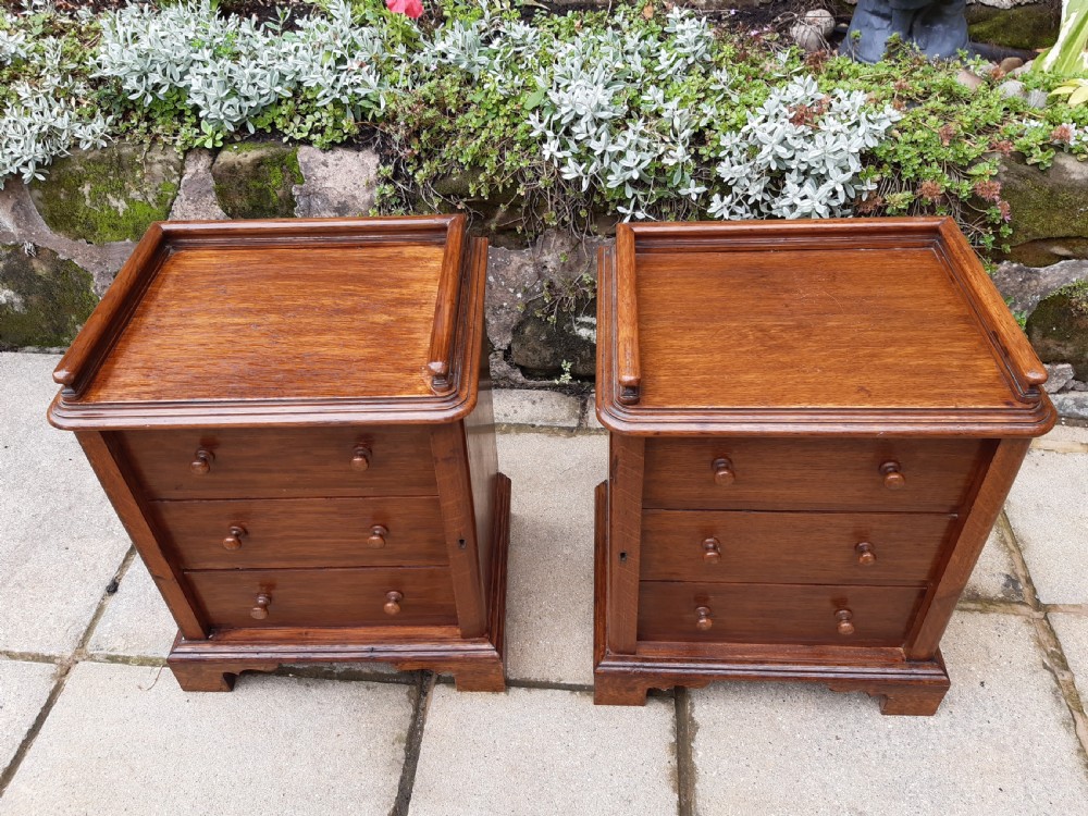 A pair of small oak set of  drawers View II