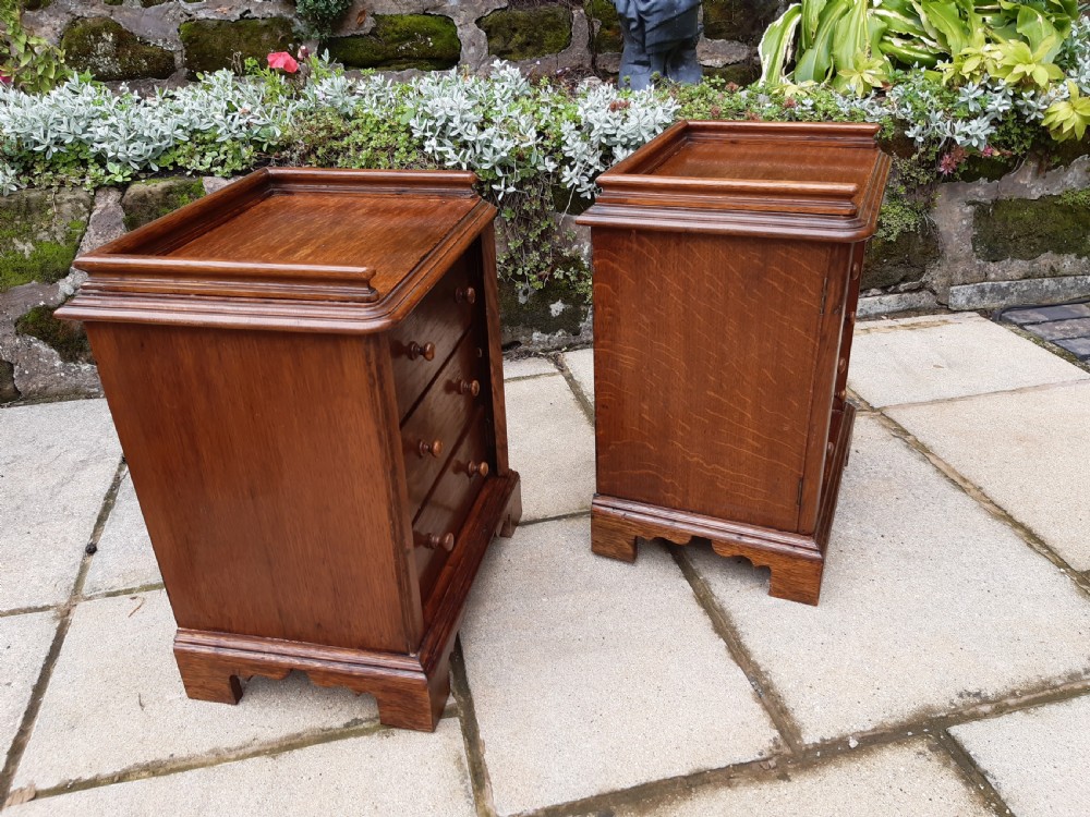 A pair of small oak set of  drawers View V