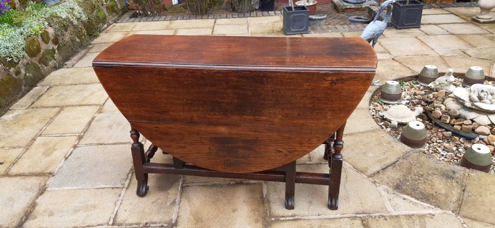 Super late 17th c oak dining table  View II
