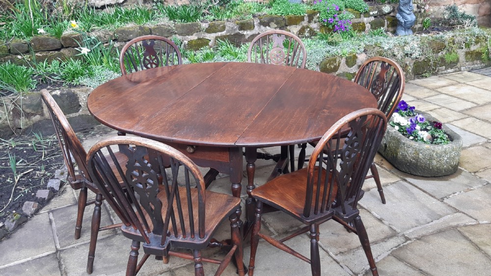 Super late 17th c oak dining table  View X