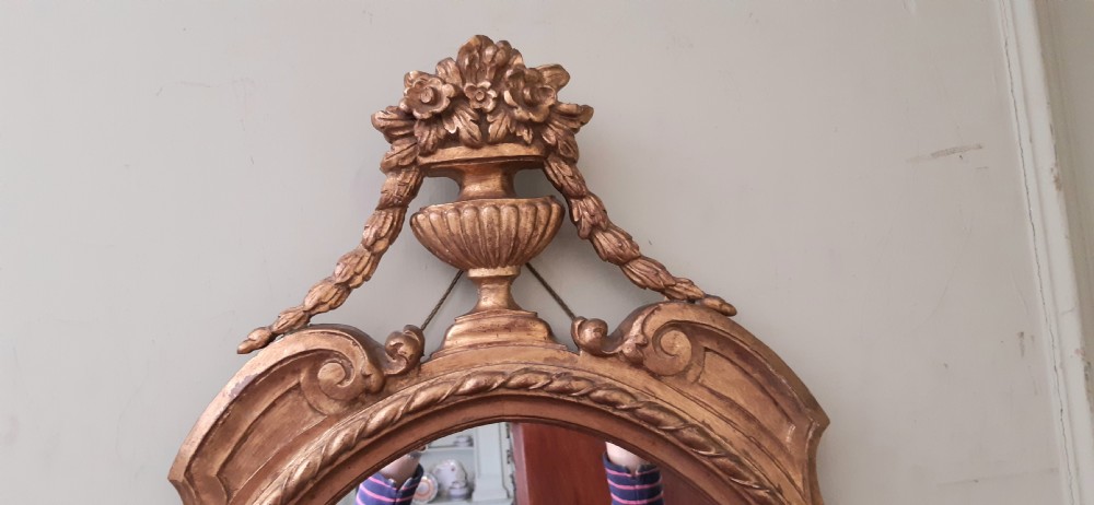 Oval gilt mirror View III
