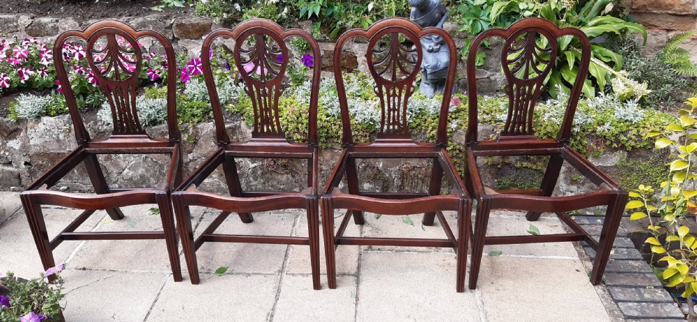 Four Georgian mahogany dining chairs View II