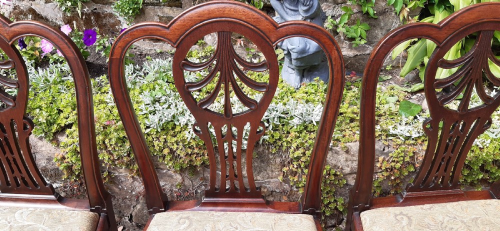 Four Georgian mahogany dining chairs View III