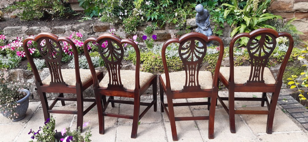 Four Georgian mahogany dining chairs View V