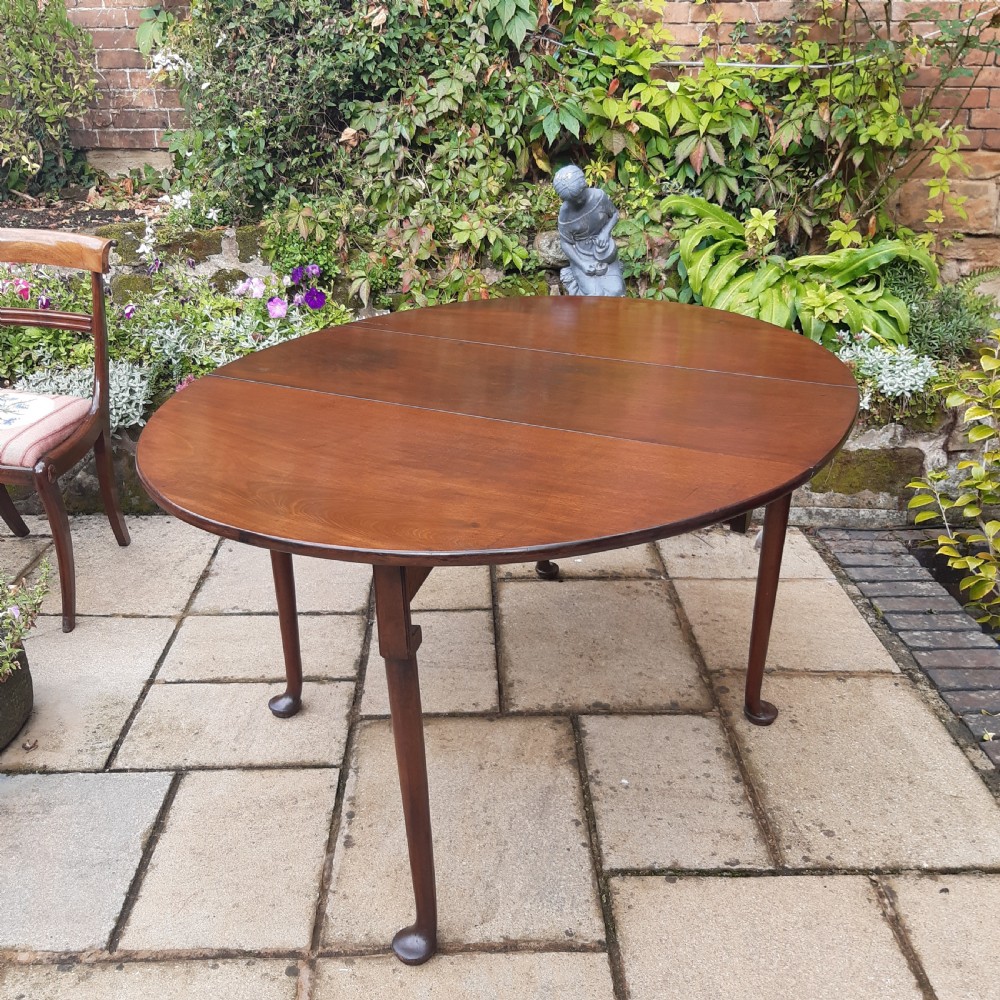 Georgian mahogany drop leaf dining table View II
