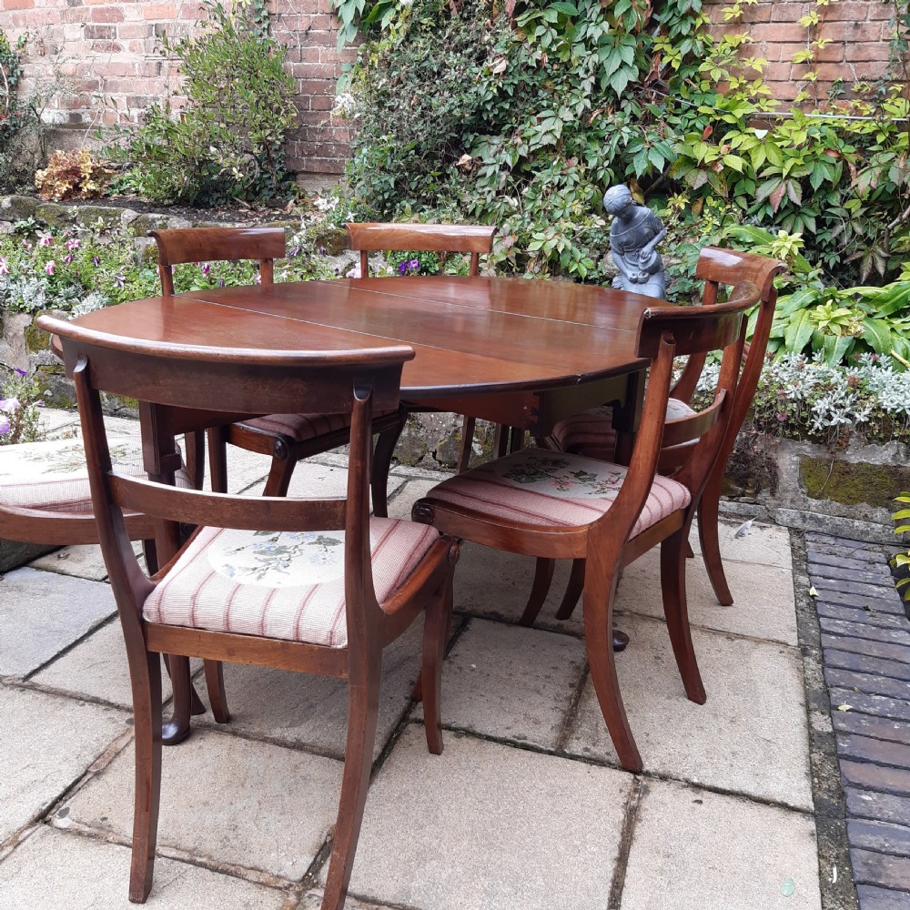 Georgian mahogany drop leaf dining table View V