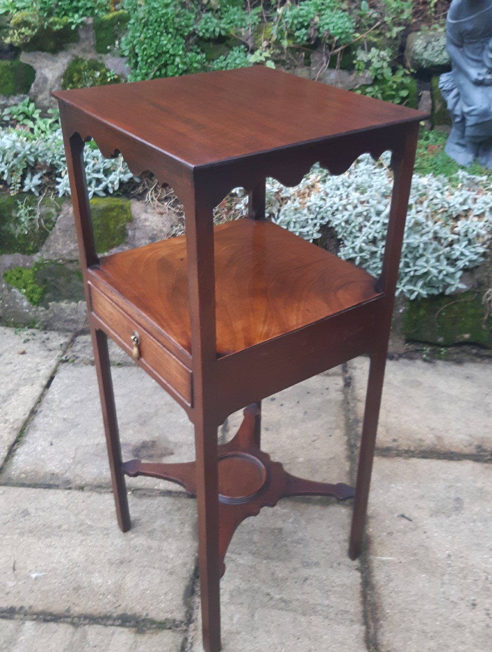 A  Georgian mahogany bedside table  View II