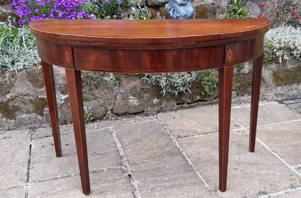 Georgian demi lune mahogany table 