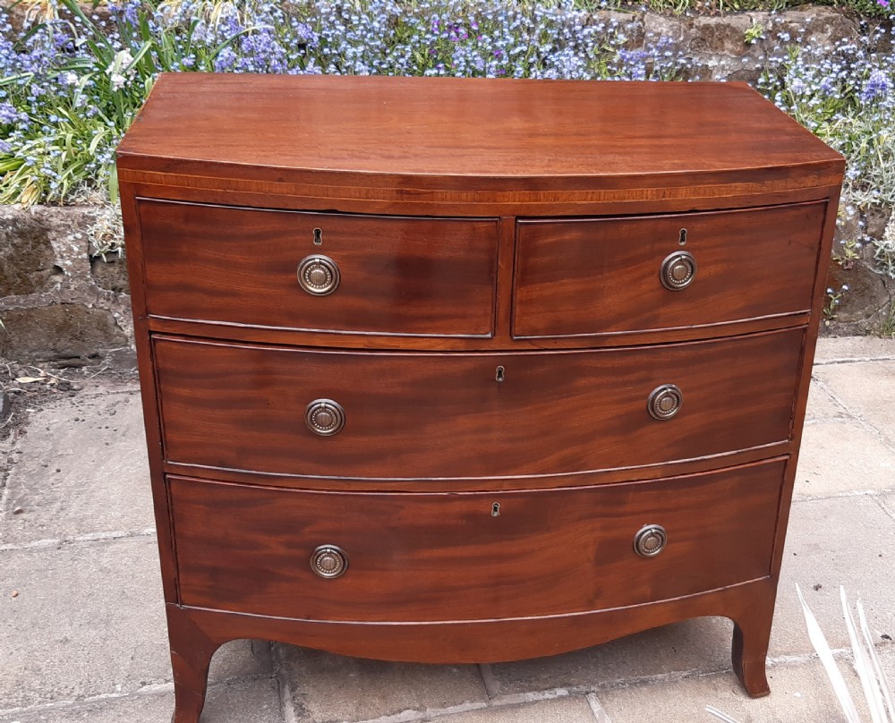 Small bowfront  or bow fronted Georgian chest of drawers