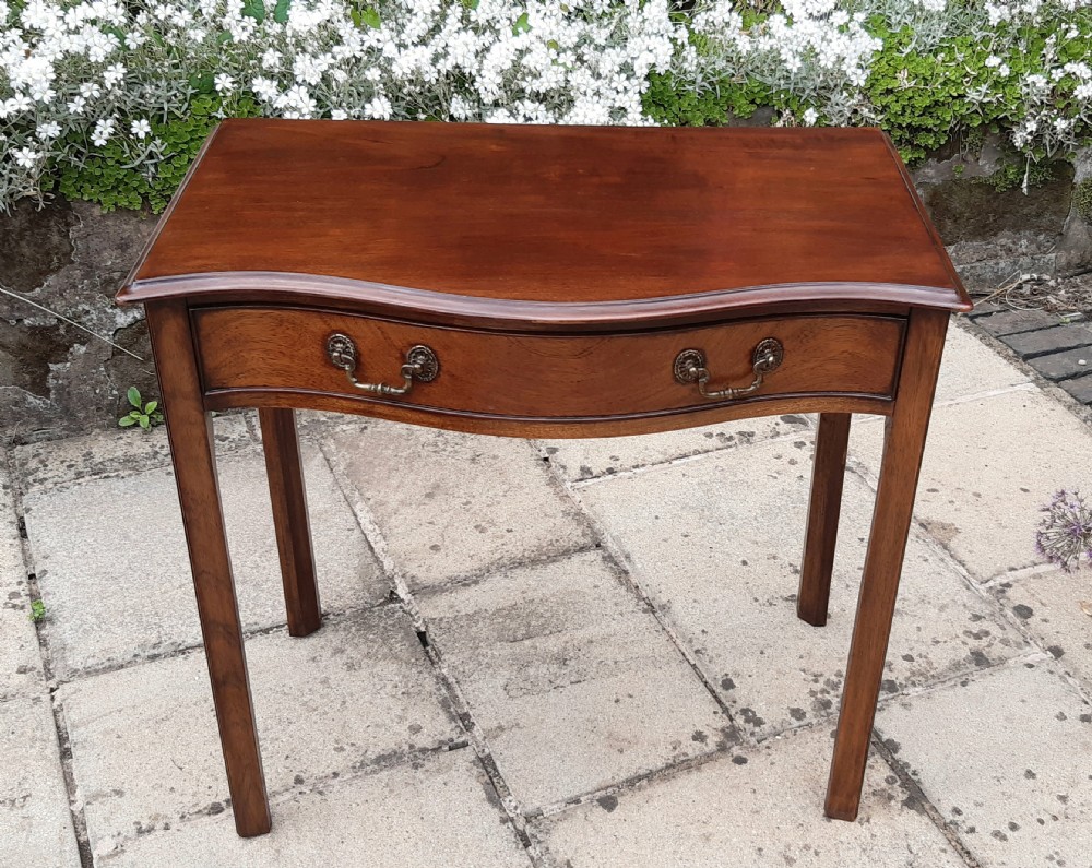 Serpentine front side table 