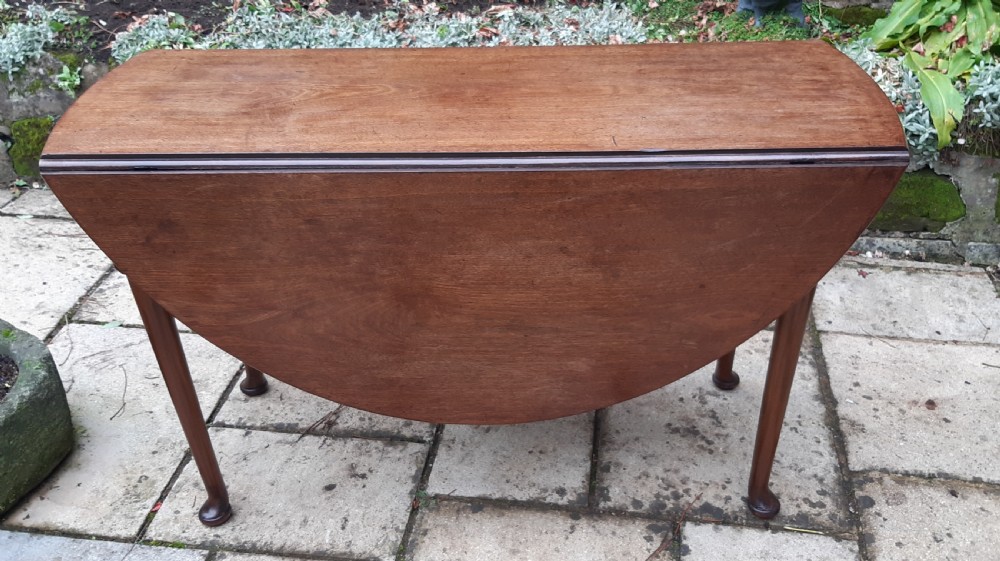 Georgian mahogany drop leaf dining table View VI