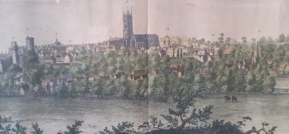 A framed panoramic 18th-century copperplate engraving showing a south-east prospect of Warwick with a grey mount and gilt frame. View IV