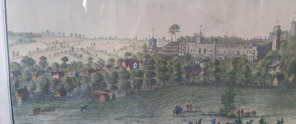 A framed panoramic 18th-century copperplate engraving showing a south-east prospect of Warwick with a grey mount and gilt frame. View VII